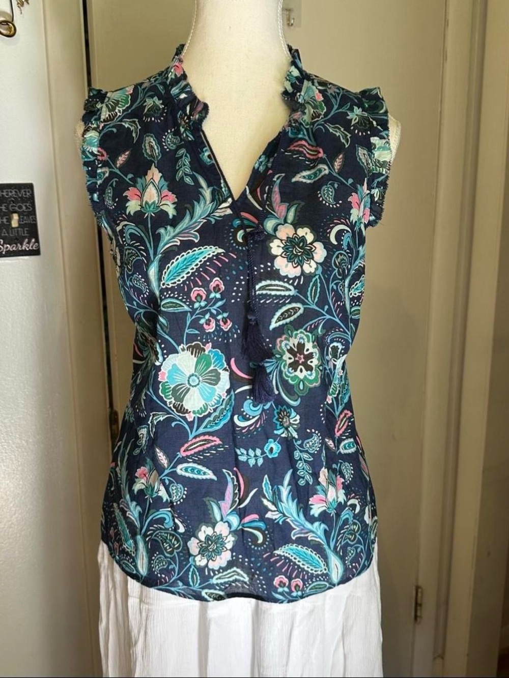 Navy blue Talbots floral blouse with ruffles and tie detail